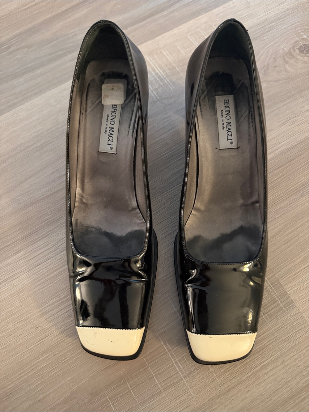 Bruno Magli Black Patent Leather Pumps with Cream Cap Toe Accent